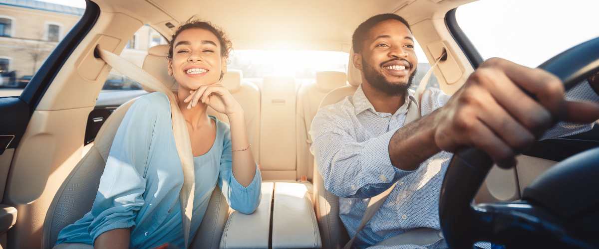 Diverse couple in a car