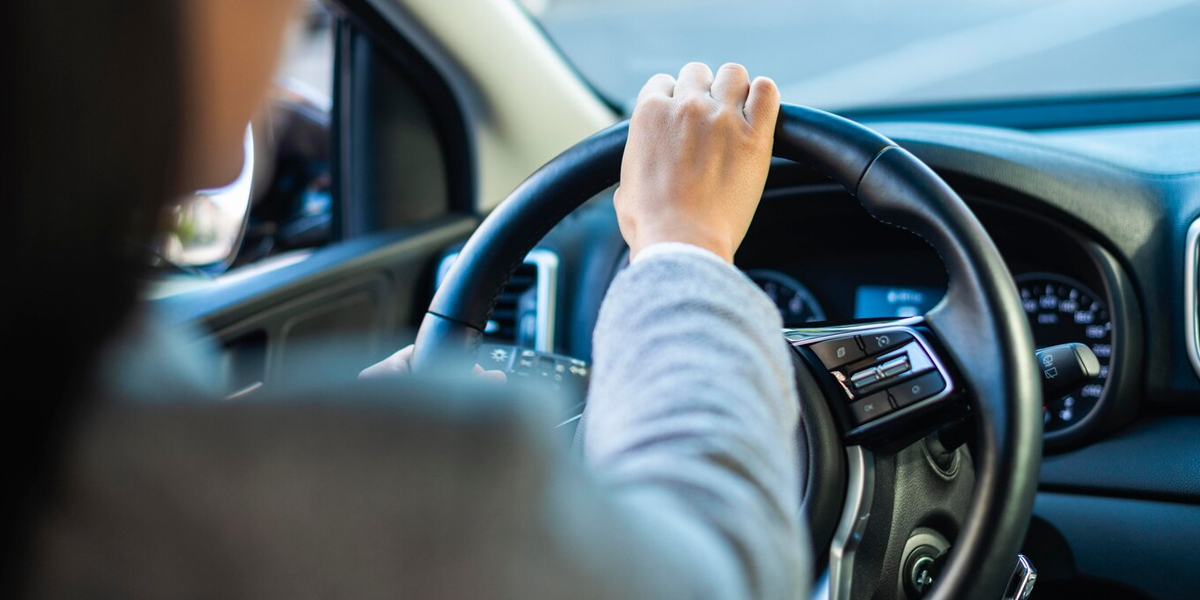 Hands on steering wheel