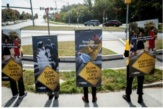 People holding signs