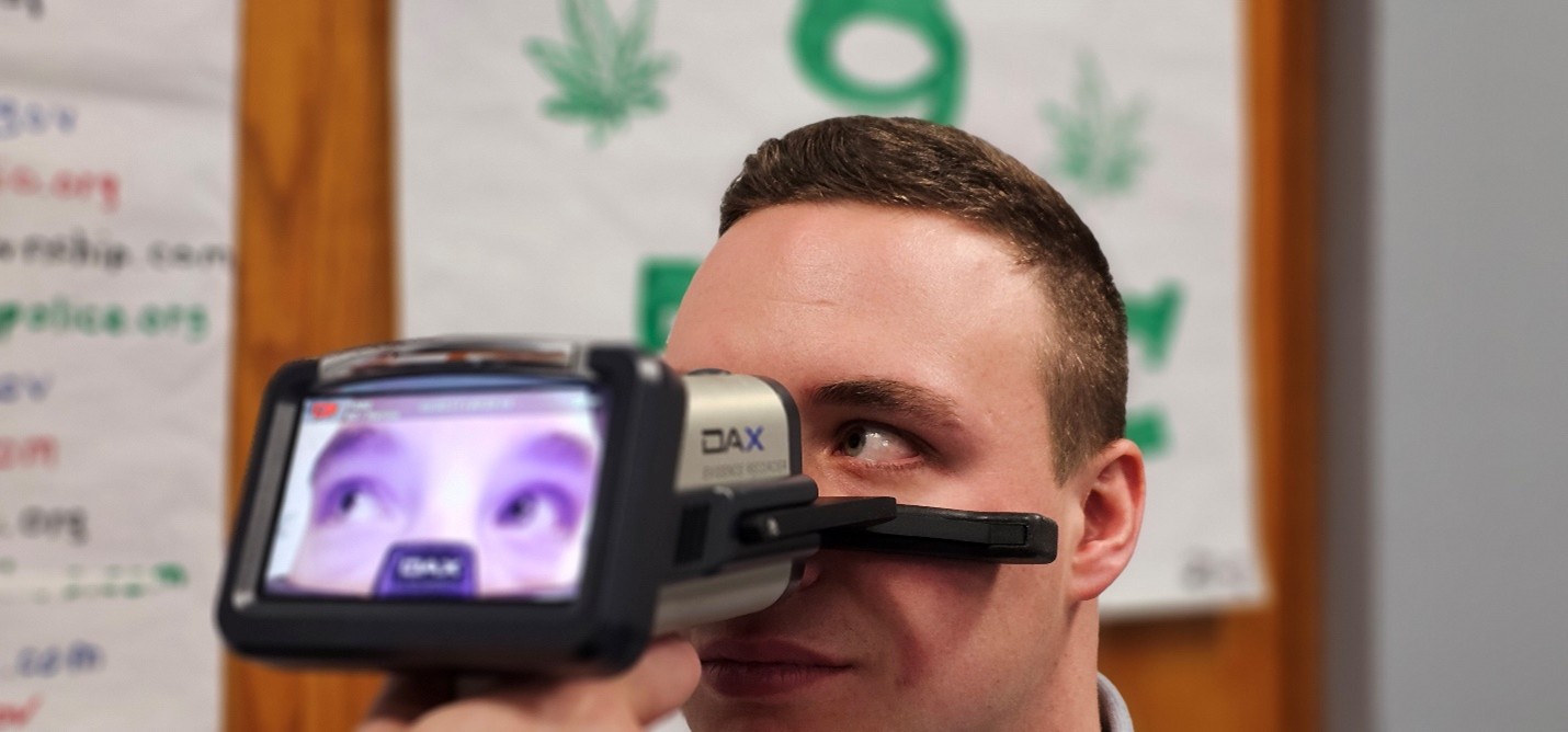 A person's eyes being scanned by a device