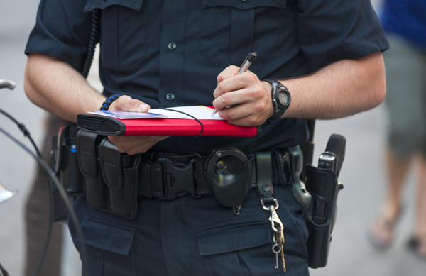 Officer writing a ticket