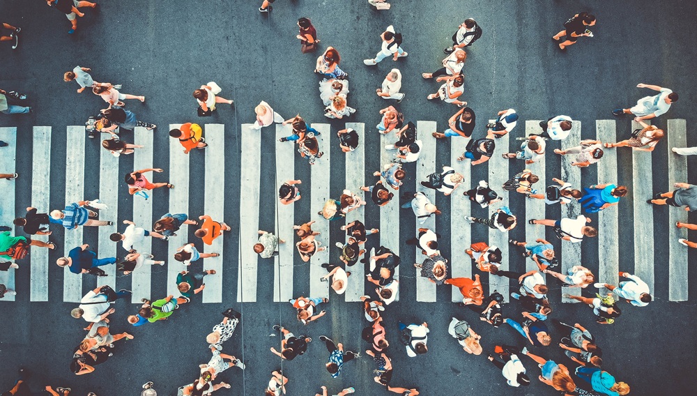 Aerial image of a crosswalk with pedestrians