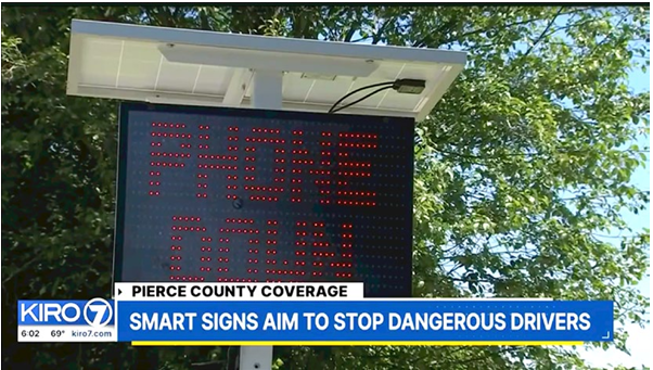 Image from a news broadcast showing a traffic sign