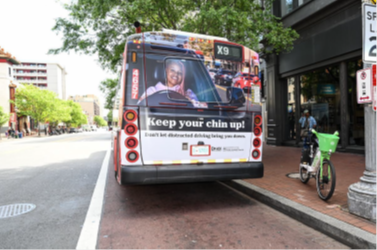 Image of the back of a bus on the street